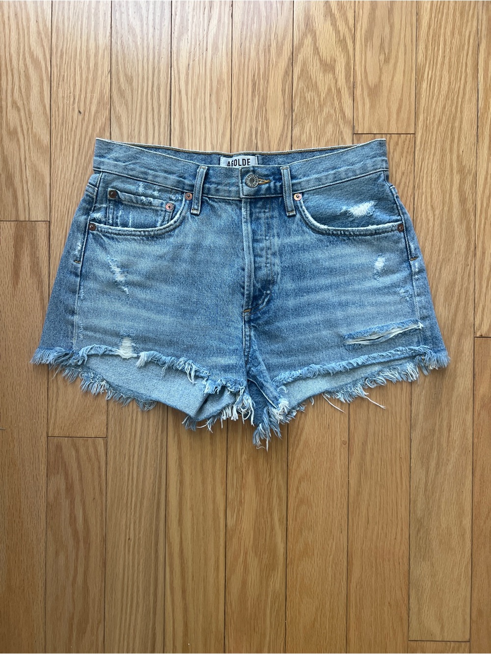Agolde Light Blue Distressed Denim Cutoff Shorts